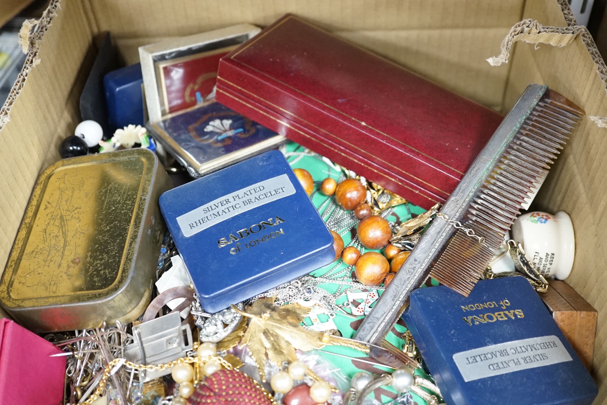 A large quantity of assorted mainly costume jewellery, including silver. Condition - fair